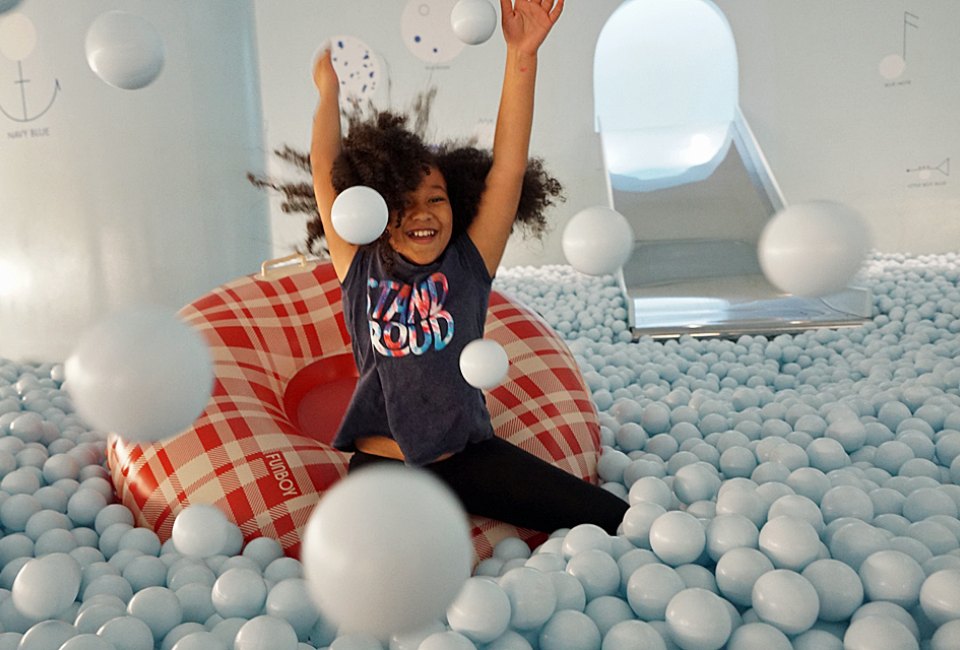 With 500,000 balls to play with, Color Factory's ball pit provides endless play and fun. 
