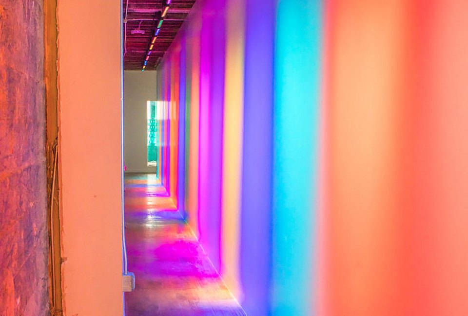 Walk down a hallway of color to beautiful and exciting discoveries at the Color Factory.