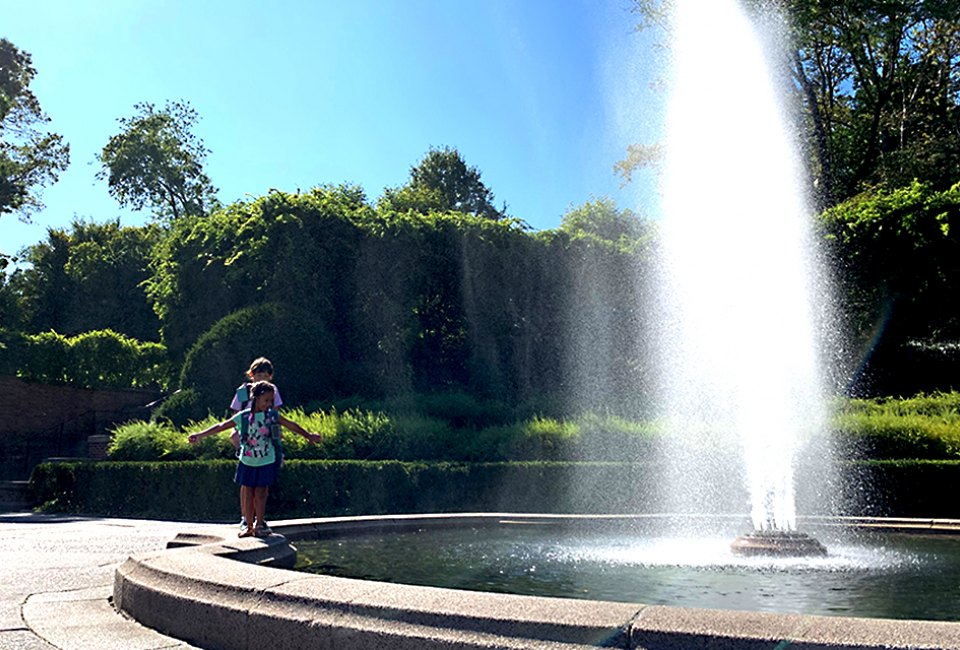 Kids can frolic around the Conservatory Garden Fountain.