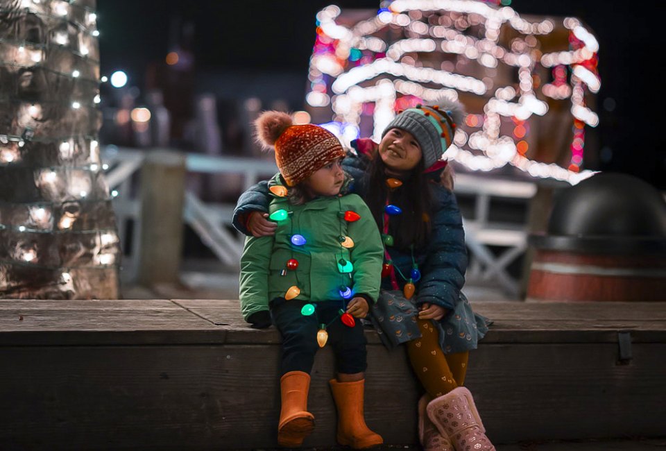 Cozy up to some holiday fun in Connecticut as December 2024 brings a little joy to the Nutmeg State! Photo courtesy of the Mystic Seaport Museum