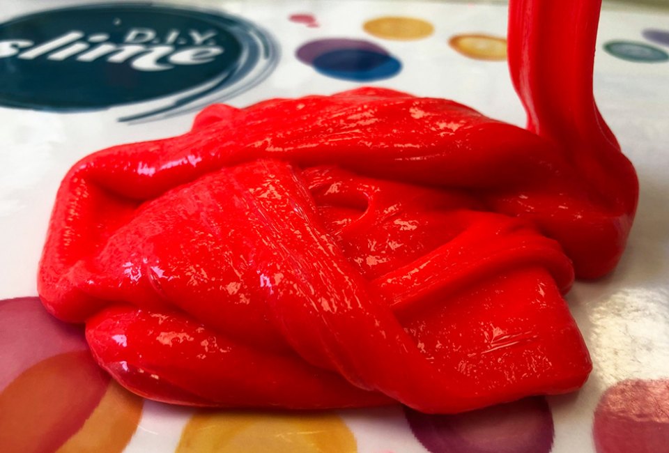 Make red slime during a spring break visit to DIY Slime