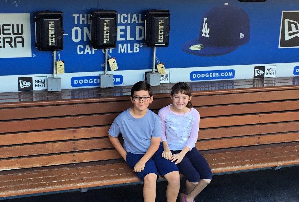 Kids can sit in the dugout when touring Dodger Stadium. Photo by Meghan Rose