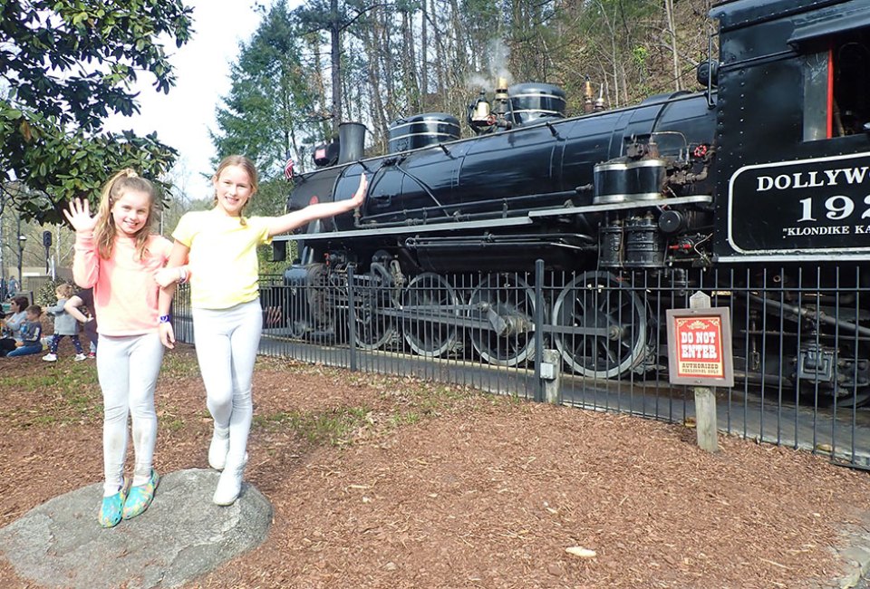 Ride the iconic Dollywood Express, a coal-fired steam train. 
