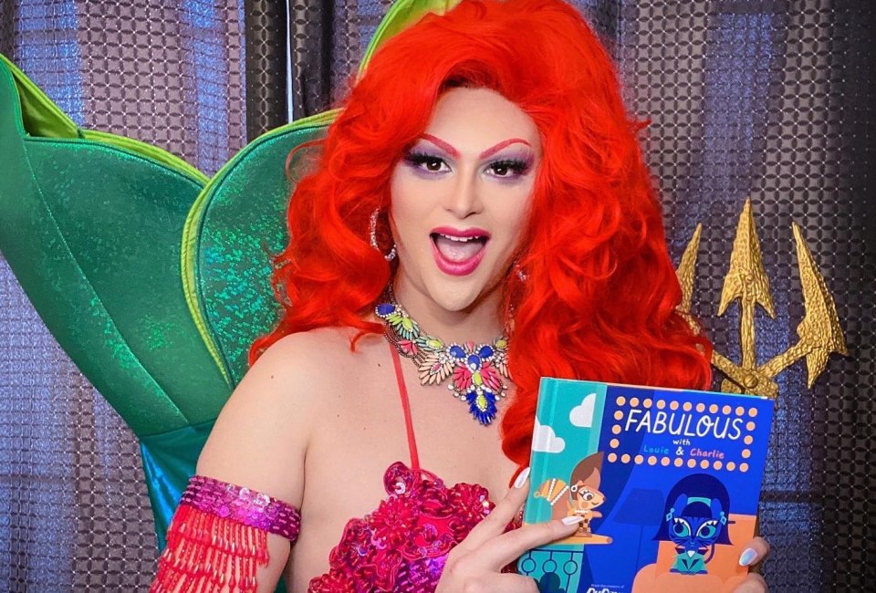 Mermaid Queen Bella Noche reads a story at the library. Photo courtesy of Drag Queen Story Hour