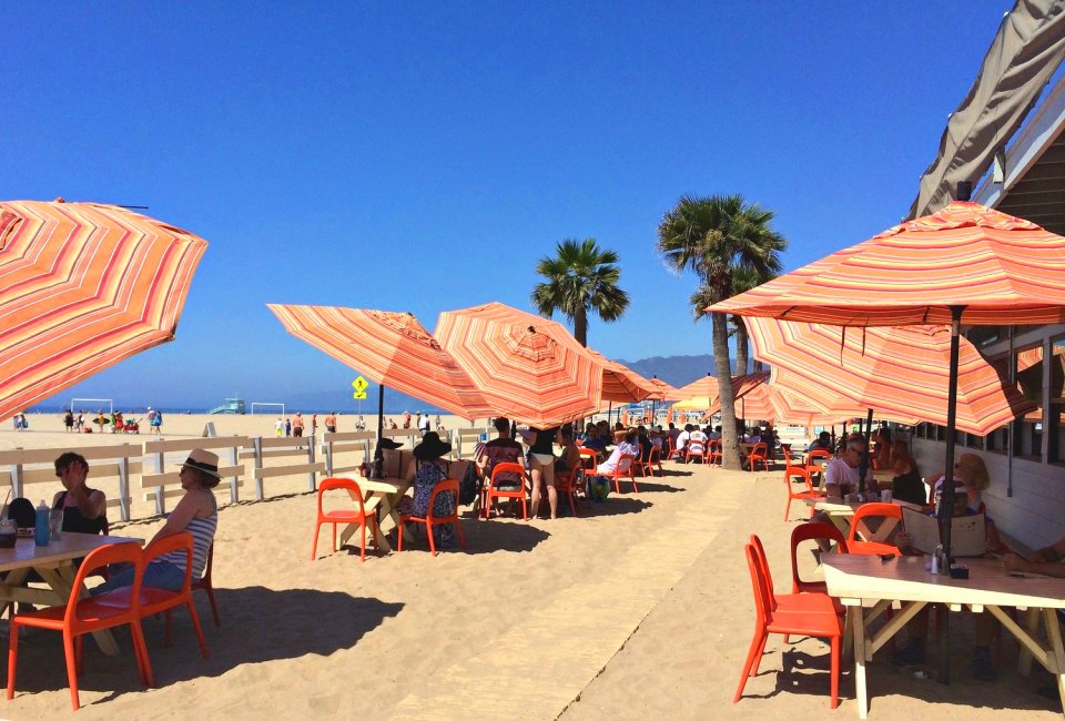 Kids can build sandcastles while parents dine on the beach. Photo courtesy of Back on the Beach Cafe in Santa Monica