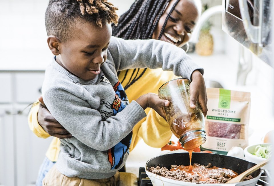 One top tip is getting kids involved from the planning stage, and they'll want to help cook! Photo by Brooke Lark, via Pexels