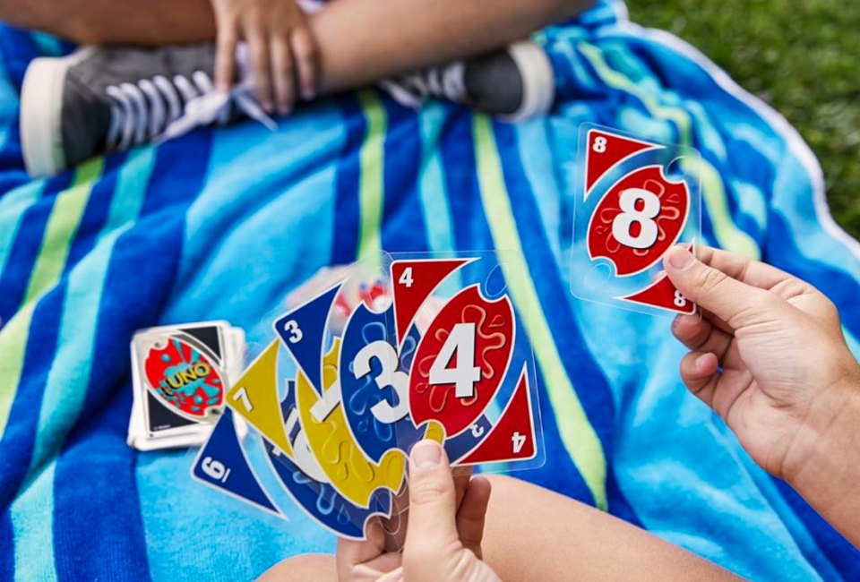 You don't have to worry about UNO Splash cards getting wet! Photo courtesy of Mattel Games, via the UNO Amazon Store.