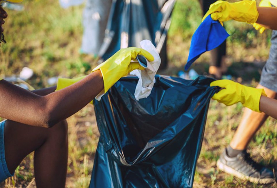 Cleaning up a local park is a great way to celebrate Earth Day. Photo courtesy of Canva