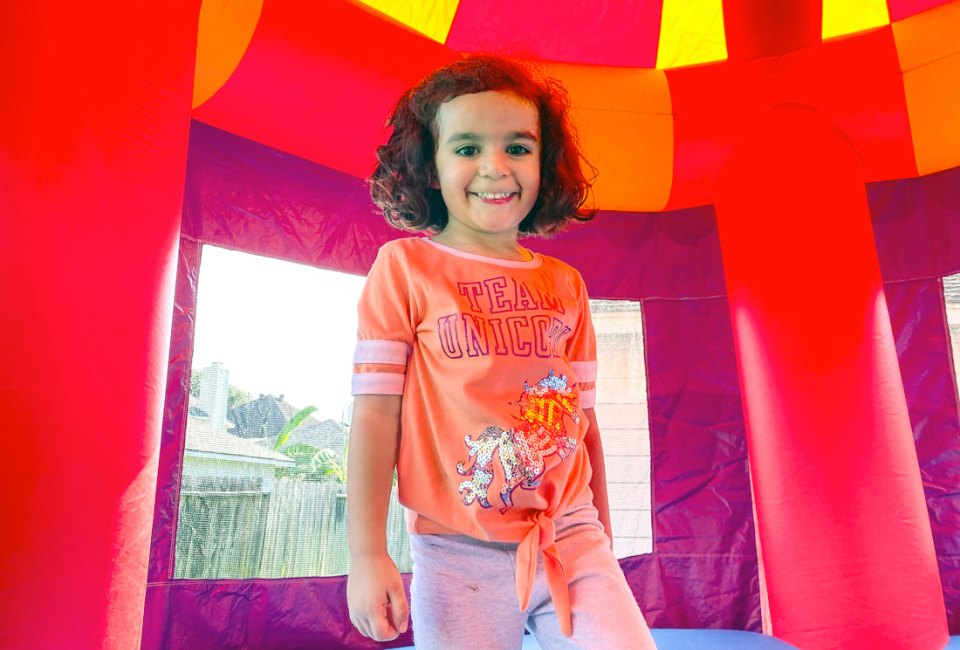 Houston birthday party rentals bring bounce houses and water slides to your backyard. Photo courtesy of Sky High Party Rentals
