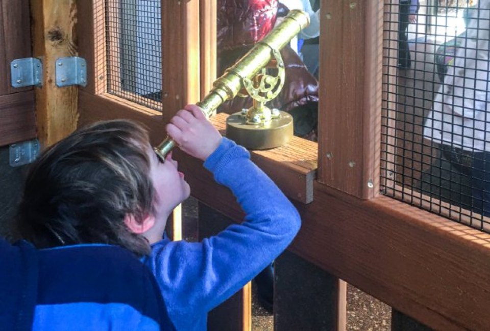 picture of a boy at the Pritzker family play zoo, where there is a free indoor playground