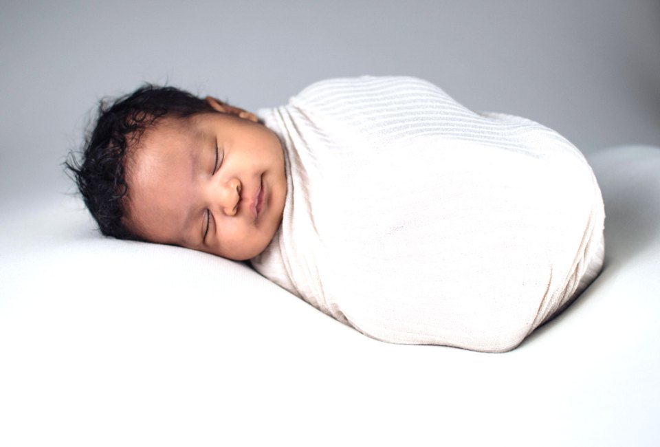 Have sweet dreams of all the free baby stuff you'll get. Photo by Garrett Jackson courtesy of Unsplash
