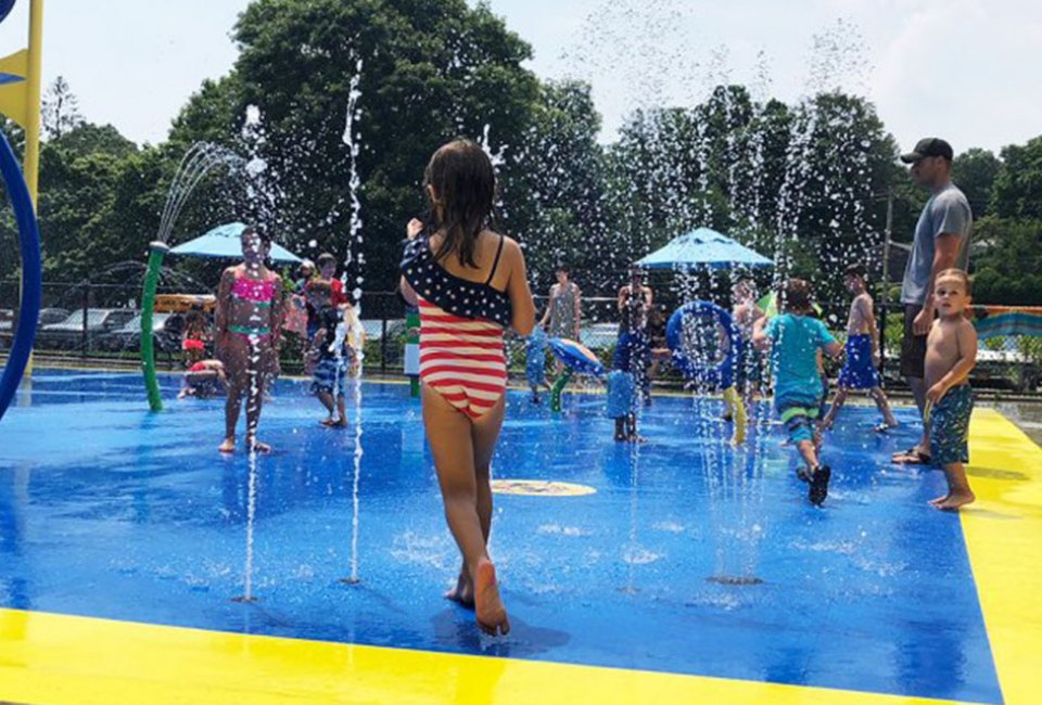 The Sgt. Paul Tuozzolo Memorial Spray Park thrills kids young and old. Photo by Jen Tomeo