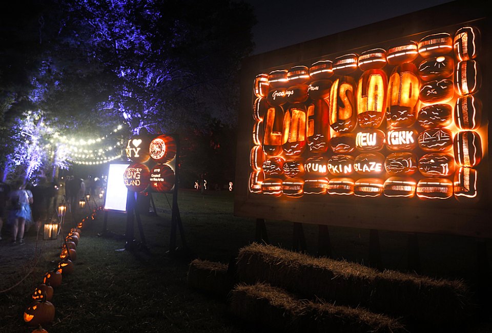 The Great Jack O'Lantern Blaze returns to Old Bethpage Village Restoration and makes for a stunning day trip after dark. Photo courtesy of Historic Hudson Valley