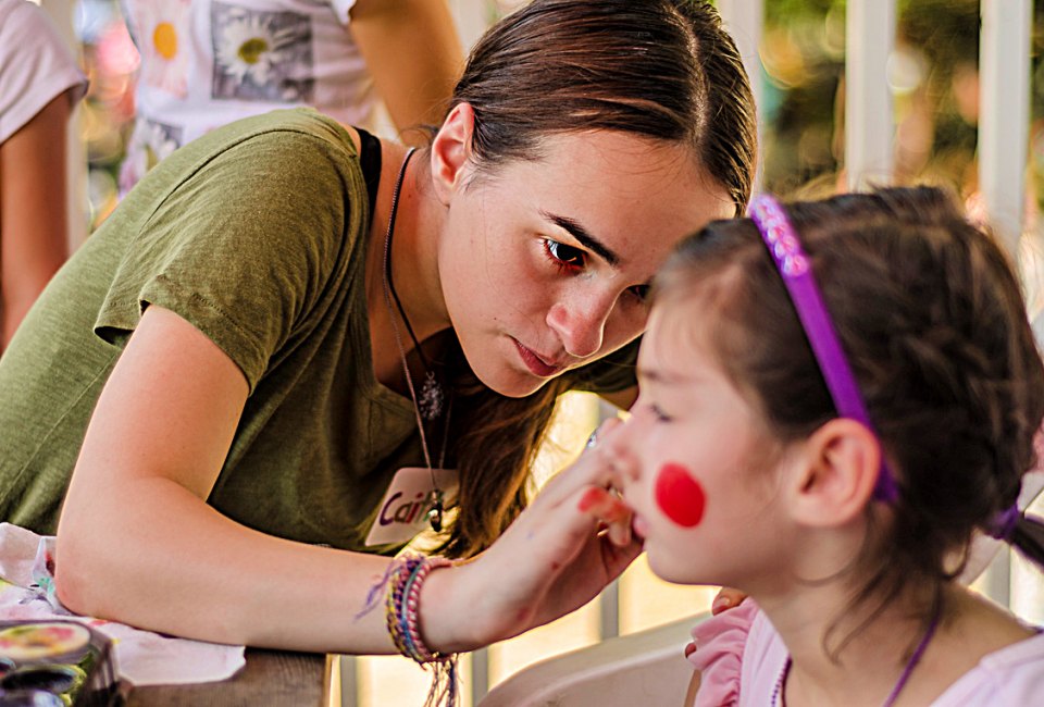 Facepainting is a hit at the Fall Festival at Newton Community Farm. Photo by Bruce Wilson