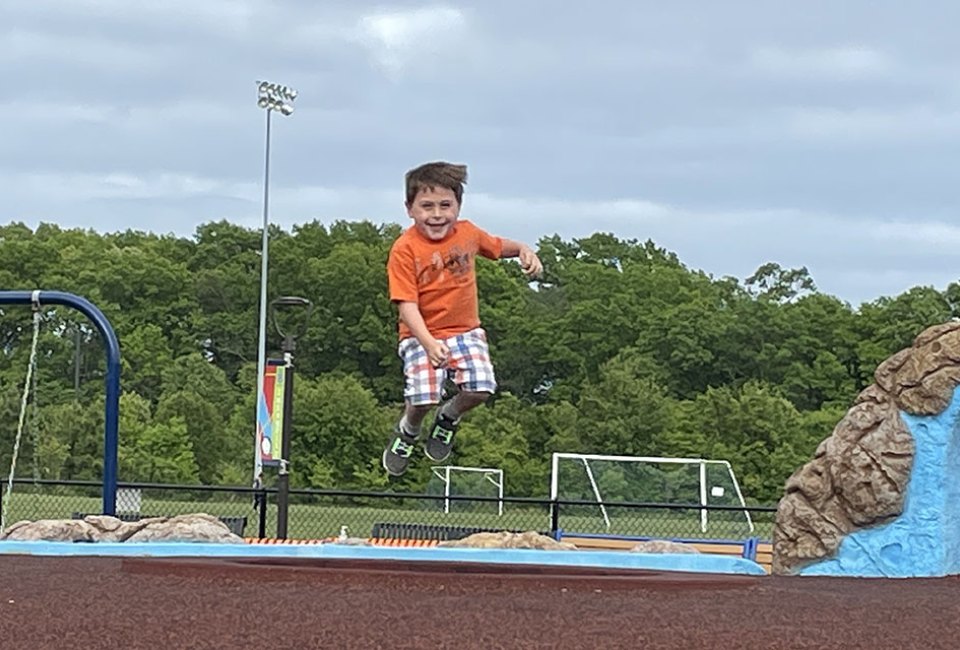 Kids of all ages and abilities go wild for a romp in the inclusive Toms River Field of Dreams Playground. 
