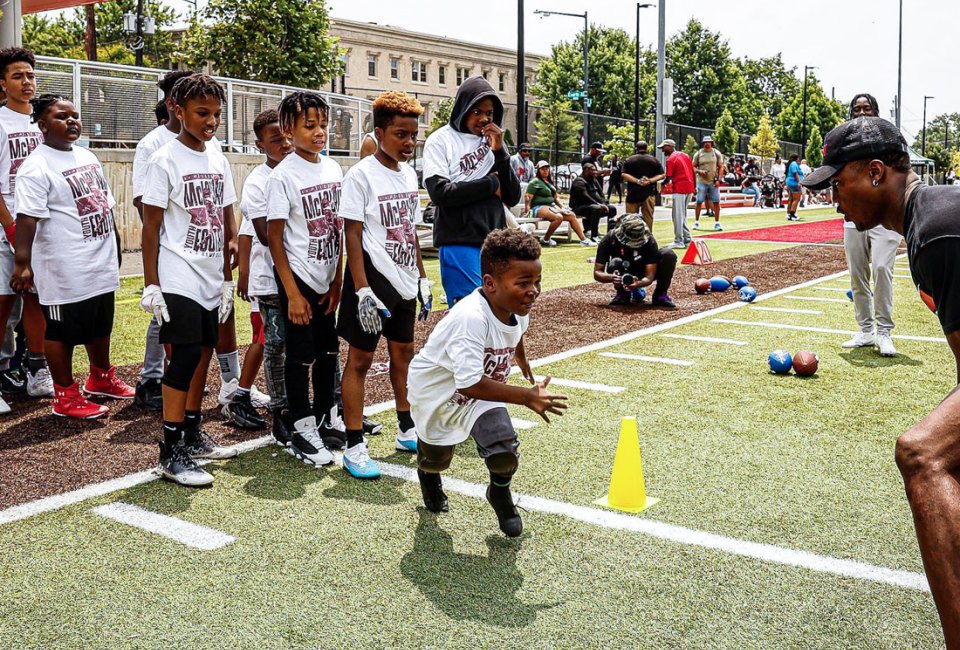The DC Department of Parks & Recreation offers a variety of affordable summer camps, including football camp. Photo at Edgewood Rec Center, courtesy of  DC Parks & Recreation