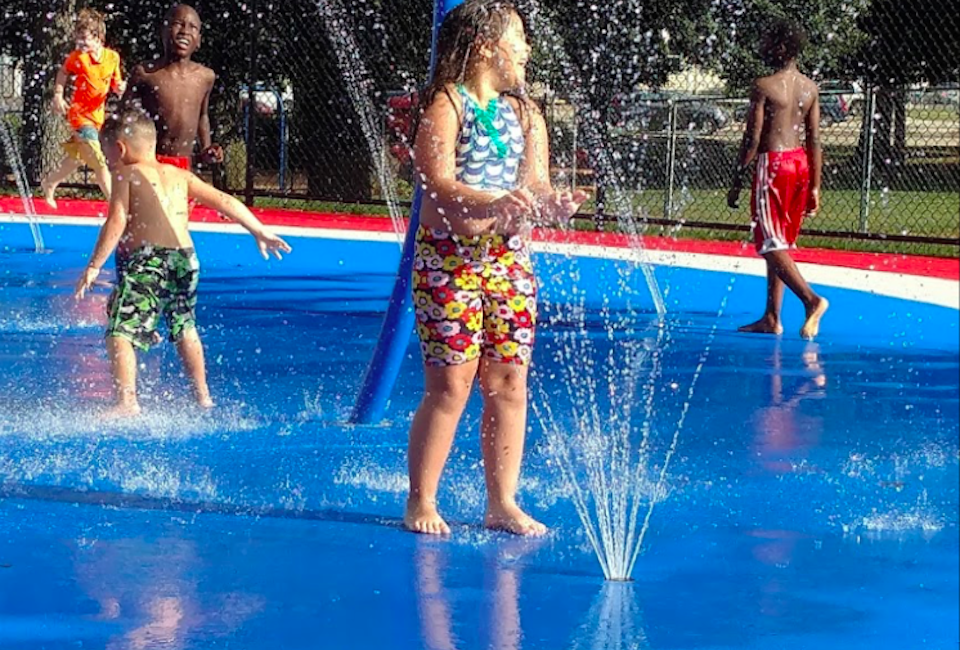 A recently renovated spray deck abuts a beloved free pool in Somerville's Foss Park. Photo courtesy of  Willene Ticianeli