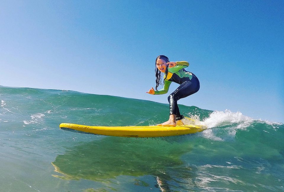 Kids of all ages can learn to hang ten. Photo courtesy of Freedom Surf Camp