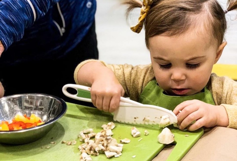 Even the littlest one learn to chop at Freshmade NYC.