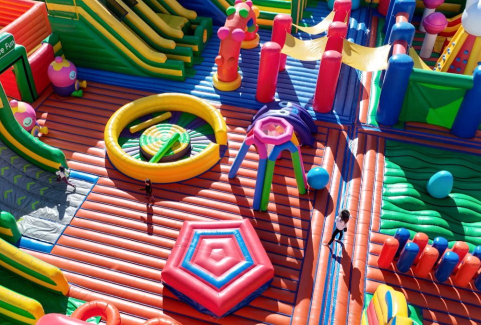 Fun is springing up all over Connecticut with amazing things to do with kids in July 2024! FUNBOX Inflatable Playground in Enfield photo courtesy of FUNBOX