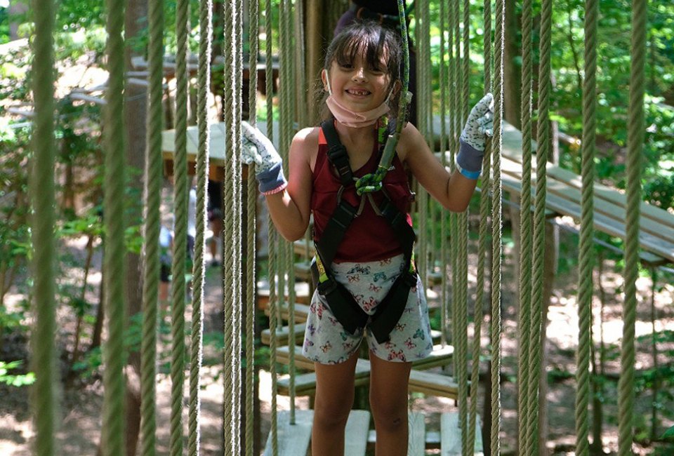 Walk the bridges at Go Ape USA. Photo courtesy the park