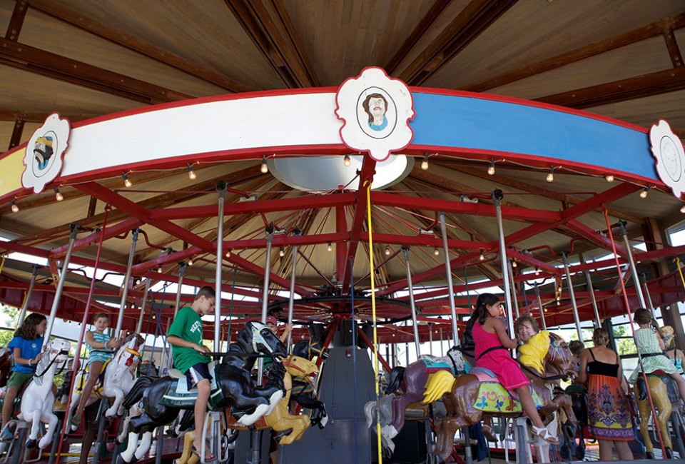 Take a ride (or two!) on the antique carousel at Mitchell Park. Photo courtesy of Greenport Village