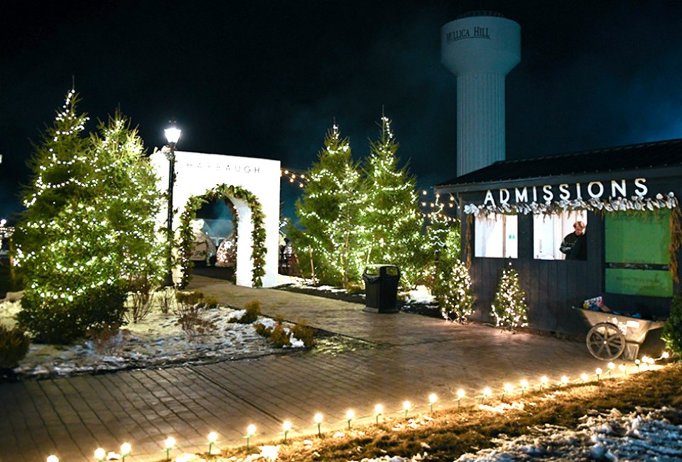 Twinkling lights greet visitors to Harbaugh Village, which focuses on family fun and giving back.