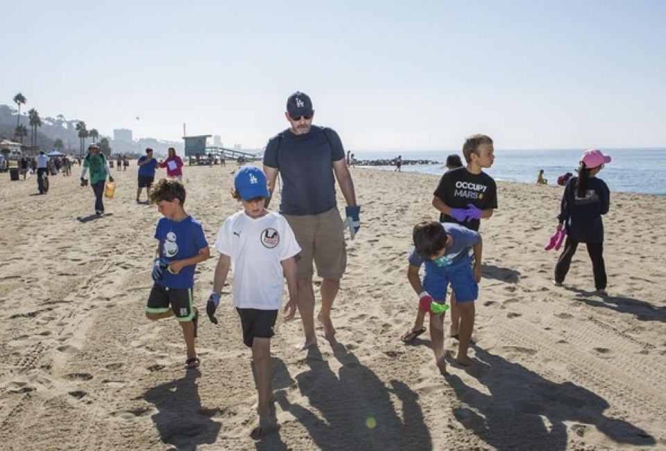 Sweep the beach at the Heal the Bay Beach Cleanup. Photo courtesy of Heal the Bay