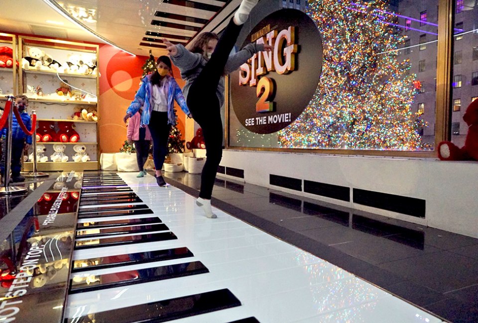 It might be pure holiday madness inside FAO Schwarz, but you'll forget the chaos when it's your turn to twirl on the giant piano with the glittering Rockefeller Center tree in the background. Photo by author