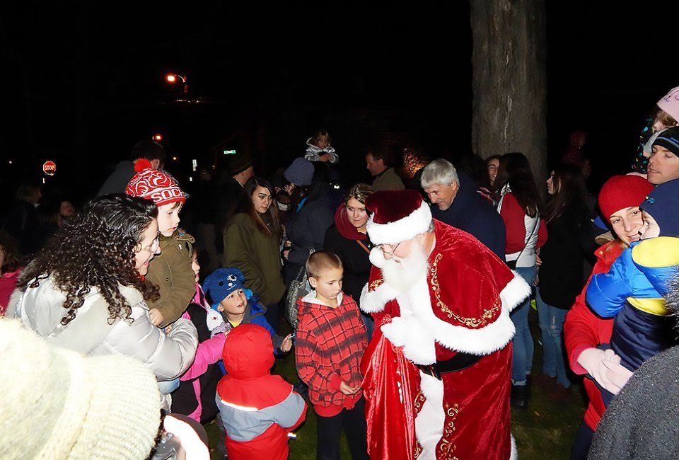 Santa greets visitors at Holiday on Huguenot Street in New Paltz. Courtesy of the event