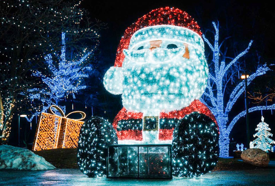 Santa Claus is beaming with excitement for the best holiday lights drive-thrus and Christmas light shows in Connecticut! Photo courtesy of Holiday Stroll at Mill River Park