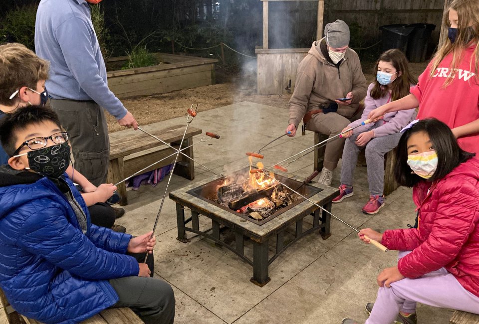 Roasting hot dogs for dinner at Nature Discovery Center's Campfire Night. Photo by author 