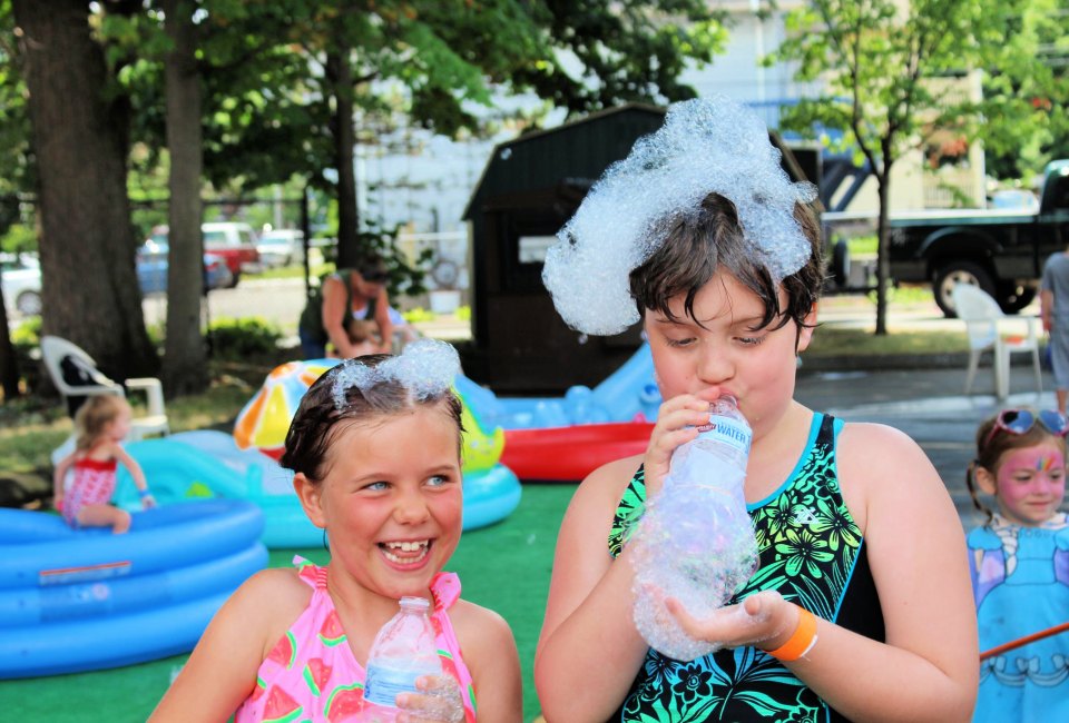 Splash and blow bubbles at the Outdoor Water Carnival. Photo courtesy of Imagine Nation 