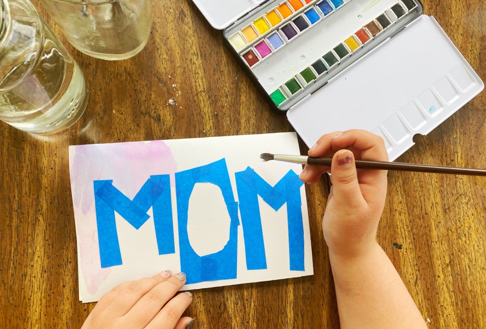 Use watercolors and painter's tape to make beautiful DIY Mother's Day cards at home.