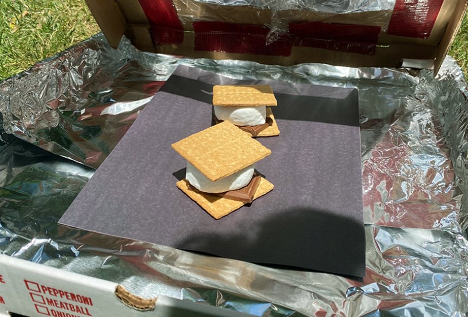 This solar oven science experiment offers one tasty reward: ooey, gooey s'mores.