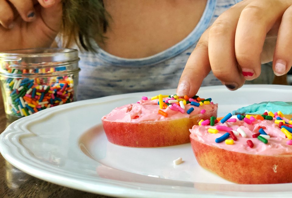 These apple donuts are adorably delicious and a sweet camp treat.