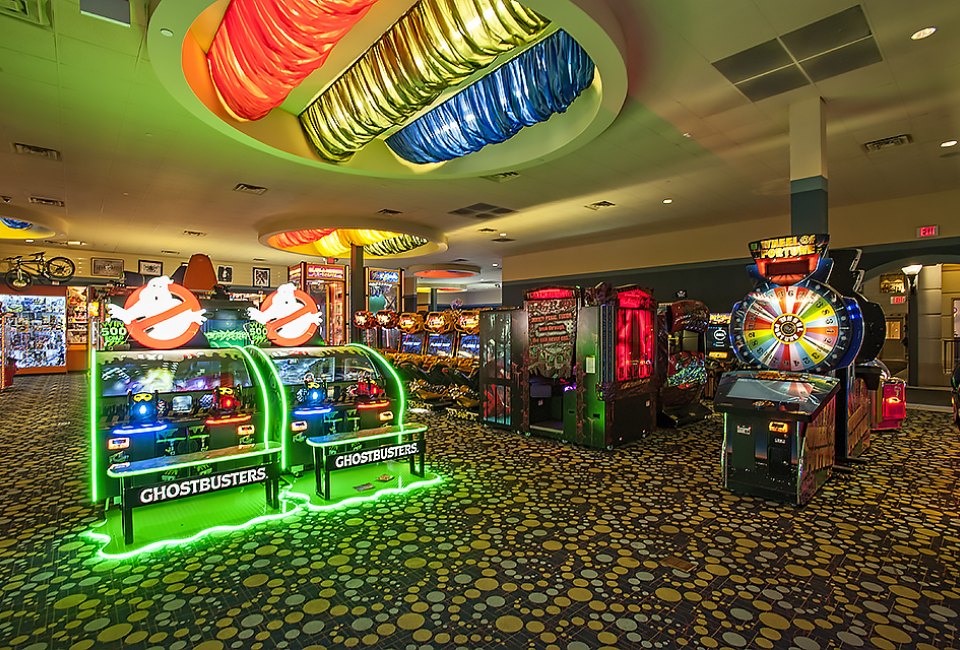 Ghostbusters and Wheel of Fortune are among the classic arcade games at iPlay America. 