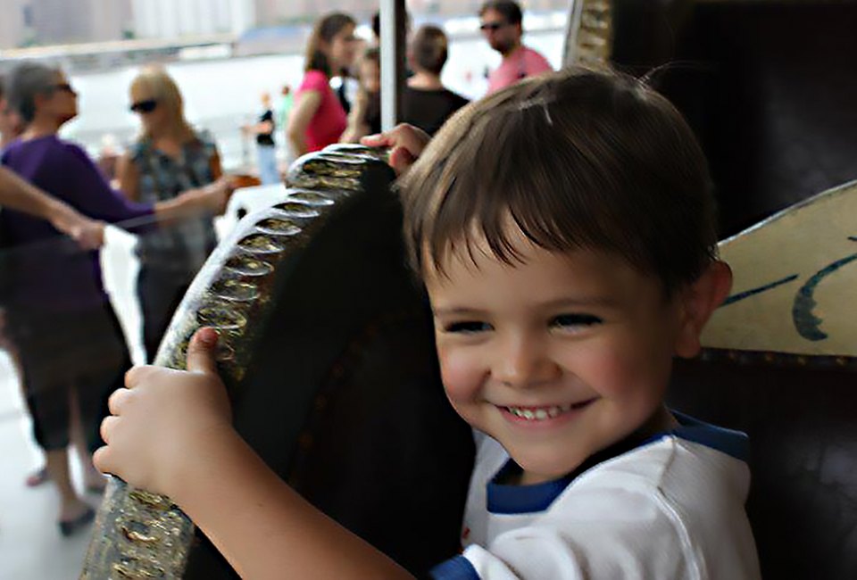 It's all smiles at Jane's Carousel in Brooklyn Bridge Park. Photo by Megan Newhart