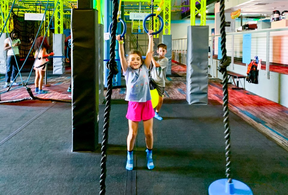 Kids can swing, climb, and jump their way through the ninja warrior course at ZavaZone. Photo by Jennifer Marino Walters