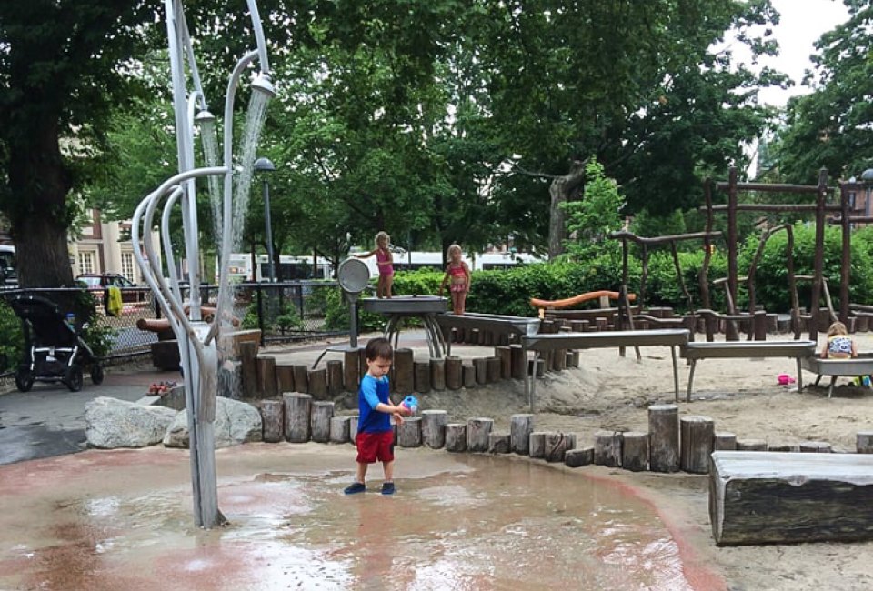 Photo of child at one of Boston's best splash pads and splash parks.