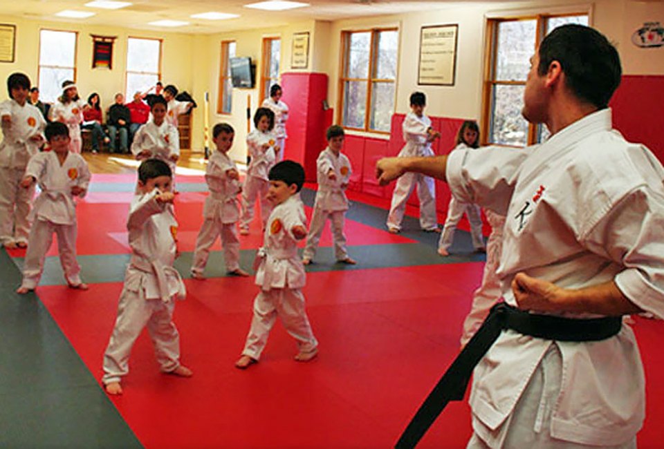 Karate classes at Ki Martial Arts increase flexibility, balance, and strength, add add to a child's confidence.