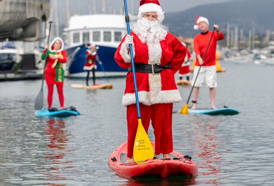 Forget the reindeer, Santa is paddling! Photo courtesy of Ventura Harbor Village