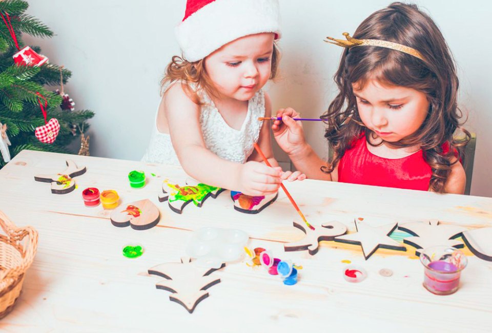 Festive crafts are an essential part of any holiday party for toddlers and preschoolers! Photo courtesy of Canva 