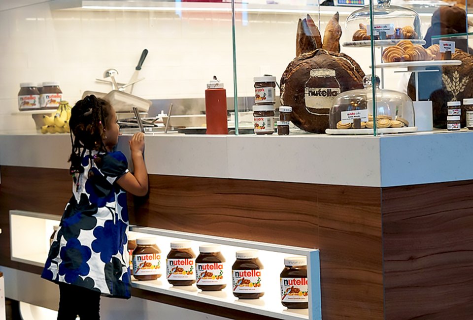 Marvel at the Nutella treats being prepared behind the counter. 