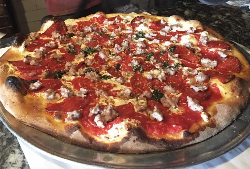 Dig in to a delicious pie at Salvatore's Coal Oven Pizzeria.