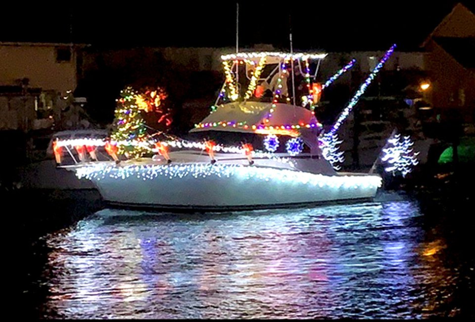 Check out holiday-decorated boats at the annual Nautical Mile Holiday Boat Parade in Freeport. Photo courtesy of the event