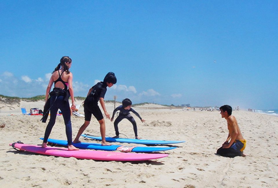 Learn to surf at Montauk's SurfLuca or another surf school. Photo courtesy of the school.