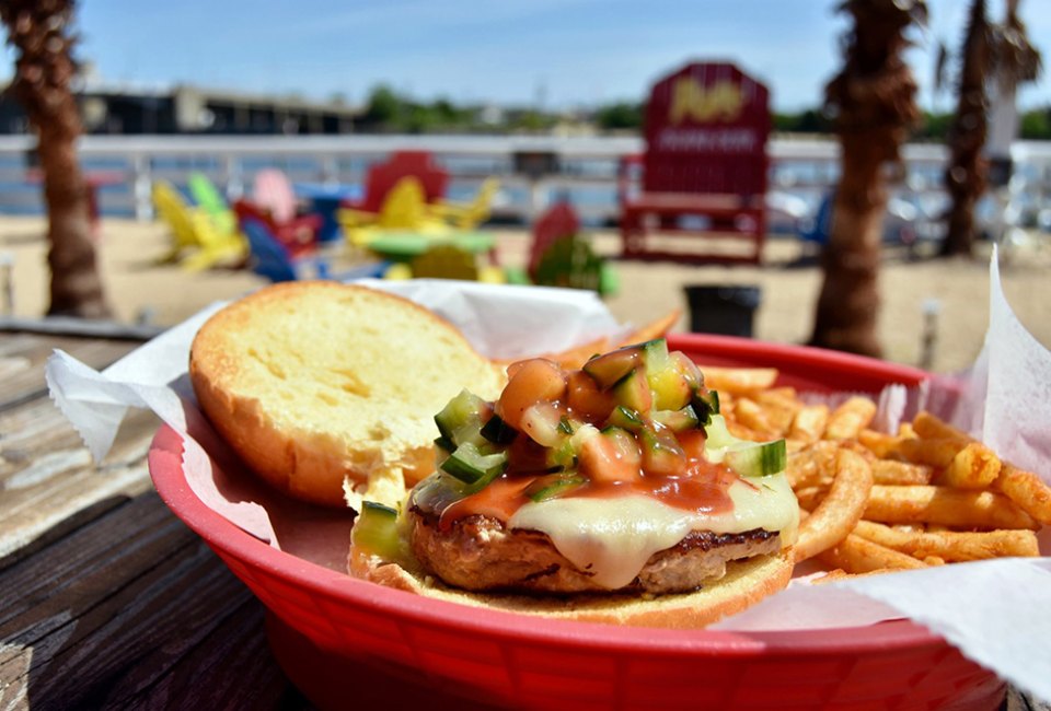 Enjoy the tropical island atmosphere at Pop's Seafood Shack and Grill in Island Park.