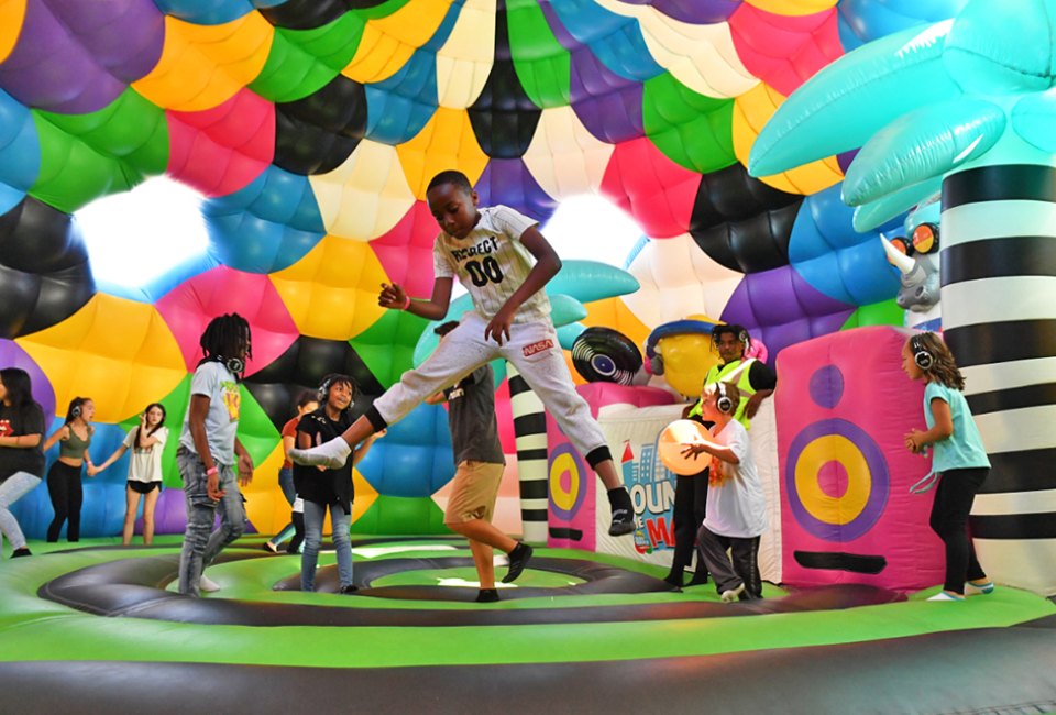 Experience a giant inflatable adventure at Bounce the City in Huntington. Photo courtesy of Bounce the City