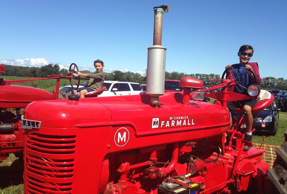 Comic Expo, Dino Exhibit, and More Things To Do on Long Island this Weekend with Kids Marvel at vintage farm equipment on display at the Fleece and Fiber Festival at Hallockville Museum Farm. Photo by the author